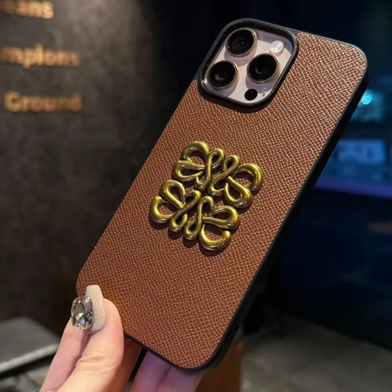 超特価 ボタン中空デザイン 立体的な金属パターン スマホケース